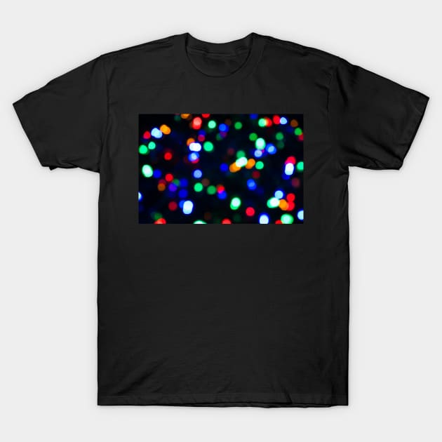 Abstract blurred effect Illuminated closeup of tangled Christmas lights T-Shirt by Russell102